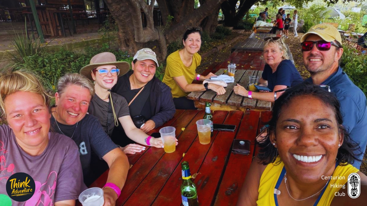 Hikers group enjoying a drink at the 4 Ways Farmers Market