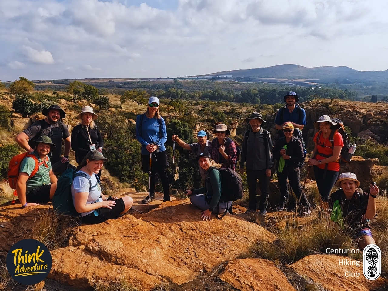 A group photo of hikers at the edge of the gorge at Milorho Hiking Trails