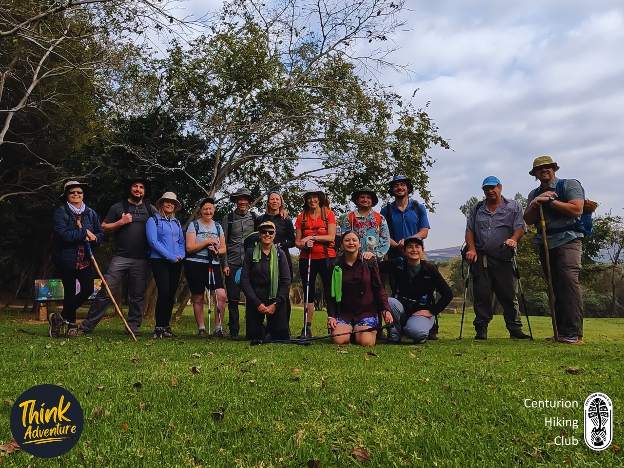 A group of hikers at the base of the Green Trail at Milorho Hiking Trails