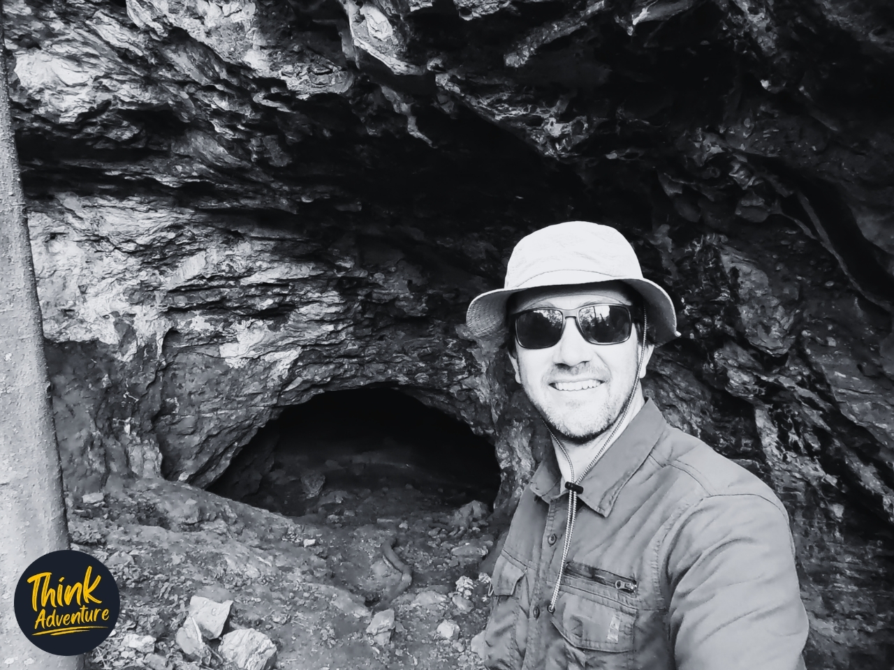 Hiker in front of the Main Cave entrance at the Hoogland Hiking Trails